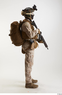 Photos Casye Schneider Paratrooper holding gun standing whole body 0007.jpg